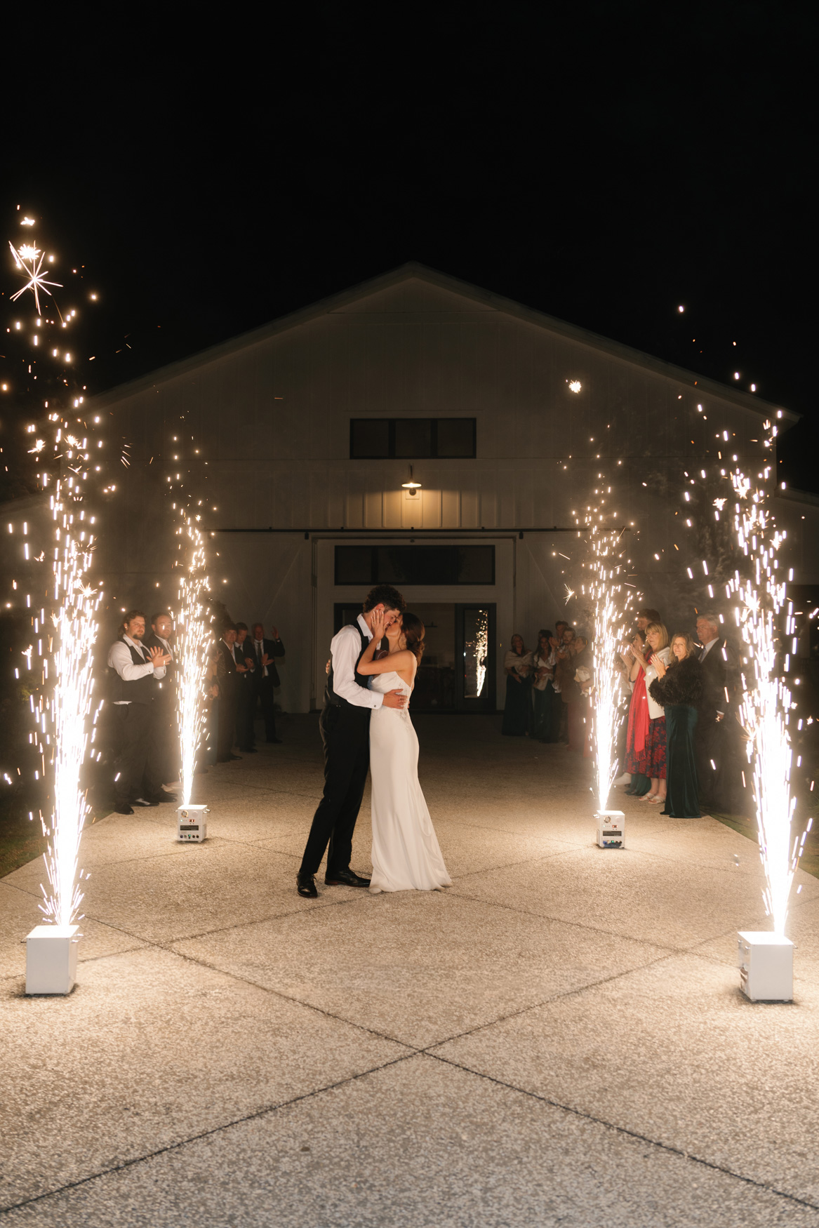 Couple sharing a last dance between sparklers at White Oaks Farm
