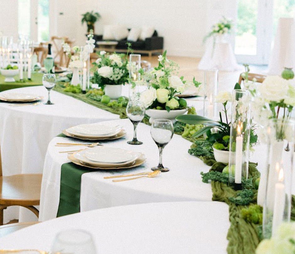 Clean tables with flowers and lights